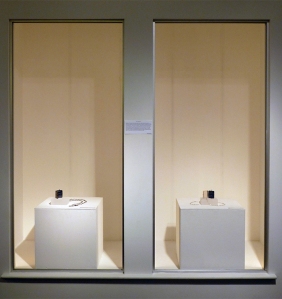 P.Sullivan, installation view, "Widget Locket #2 and #3", at Lapham Gallery, NY. Chased and repoussé sterling, fabric, Plexiglas, archival paper, 2014.