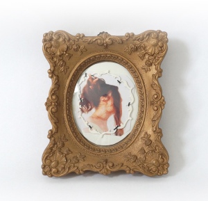 Patricia Sullivan, "Cameo Relief of Woman Holding Her Hair." Vintage painted shadow box frame, vintage glass, brass hardware, digital photo on archival paper, microwaveable soup bowl material, thread. 5 in. L x 4 7/8 in. W x 7/8 in. D, 2015.