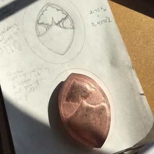 A work-in-progress (w.i.p.) Instagram photo c. April 2016 of the “Cityscape Widget” copper repoussé vessel, with planning drawings done in graphite. Photo: P. Sullivan